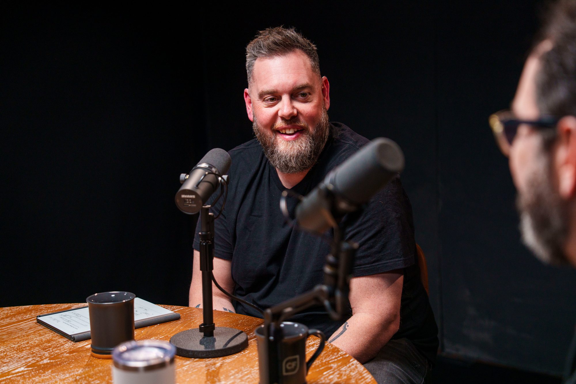 Drew Powell recording the Loving Leverage Podcast